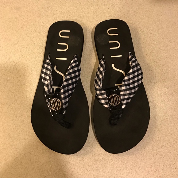 unisa flip flops black